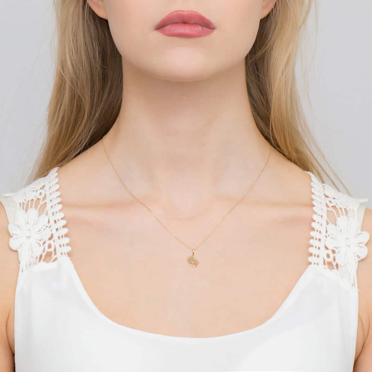 Z033-Z-585-B0.005_4.jpg Pandantiv Aur 14K cu Picioruse si Diamante 0.005 ct - Imagine 1
