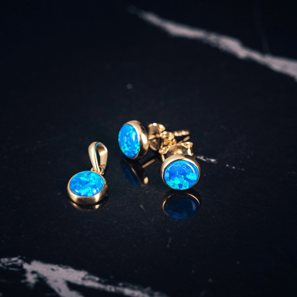 elegance-shop-bijuterie-iasi-coliere-inele-pandantive-bratari-cristale-zirconia-soare-luna-cruce-aur-galben-alb-rose-stelute-soare-ac-de-cravata-bijuterii-elegante-ocazie-92.png Set din aur cercei și pandantiv cu opal albastru S129 - Imagine 1